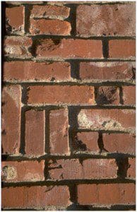 Brick in need of tuckpointing and masonry restoration